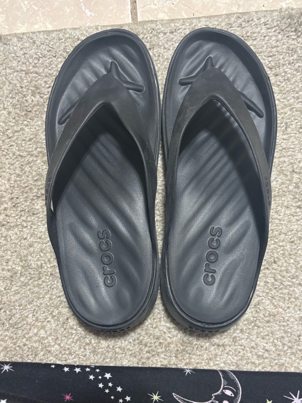 Crocs women’s Black Flip Flop Sandals